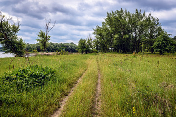 Fototapeta premium Road next to Vistula River bank near Warsaw in Poland