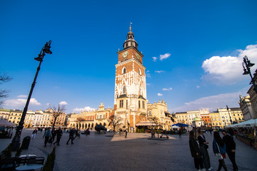 Obraz premium Poland, Krakow - April, 2019: Main Market Square and St Mary Church.