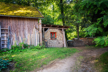Fototapeta na wymiar Small shed or hut in the woods