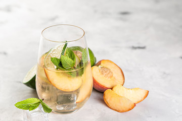 Selection of sangrias - red, pink, white and ingredients, rustic background