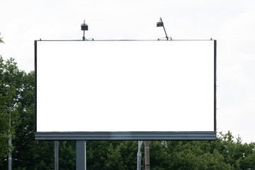 The large blank billboard with the sky, ready to use for new mockup advertisement, marketing street media and backgroud concept