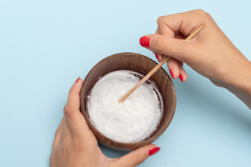 a girl making slime herself