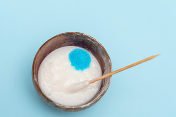 a girl making slime herself