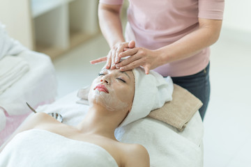 woman getting massage in spa salon
