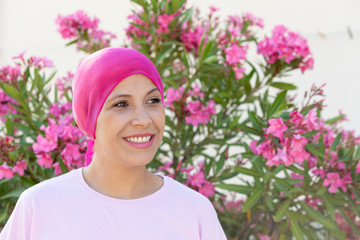 Woman with pink scarf on the head
