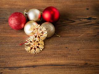 New year's and christmas decorations background on a wooden surface, top view.