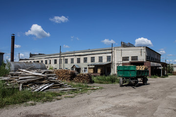 Fototapeta na wymiar The old industrial wood hangar with equipment