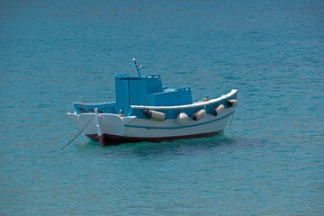 Naklejka premium small fishing boat on the sea