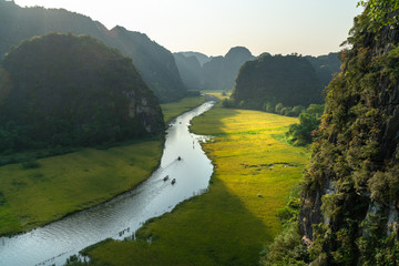 Vietnam landscape. Rice field with curve river and surrounding mountains in Tam Coc, Ninh Binh