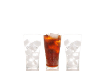 Soft Drink in The Glass and ICE in The Glass ISOLATED ON WHITE BACKGROUND. COPY SPACE.