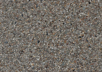 Gray background made of small natural pebble.