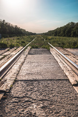 Old railway crossing in spring time