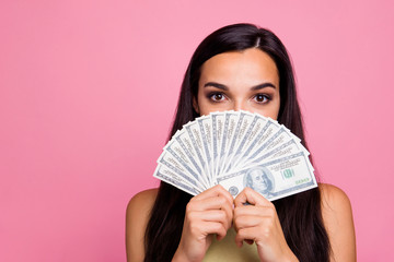 Close-up portrait of her she nice-looking lovely attractive magnificent shine glamorous girl showing closing face with a lot of money isolated over pink pastel background