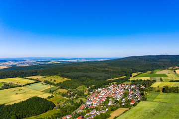 Aerial photograph, Agricultural area, Meadows, fields of cereals, villages, fields, forests. Wetterau, Hochtaunuskreis, Hesse, Germany