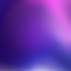 Abstract blurred gradient mesh background in bright rainbow colors.