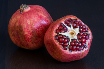 ripe pomegranate on white background - 276530323