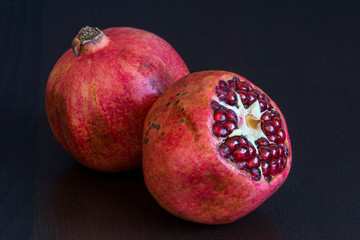 ripe pomegranate on white background - 276530332