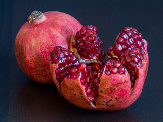 ripe pomegranate on a white background - 276530365