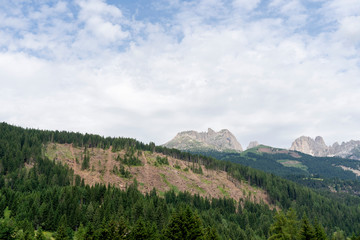 Soraga, little village in Val di Fassa, Trentino, italian Dolomites, Italy. View of Catinaccio range