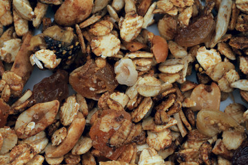 Healthy breakfast texture background. Grain breakfast ingredients on a plate. View from above,...