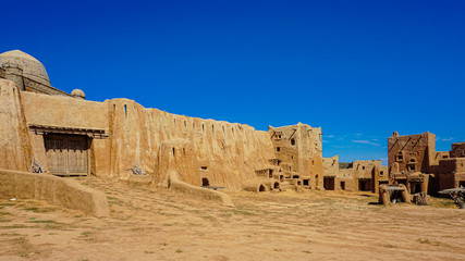 Reconstruction of the capital of the Golden Horde. On the main square of the city, on the left - the entrance to the palace of Khan, at the gates there is a brushwood for testing guests with fire