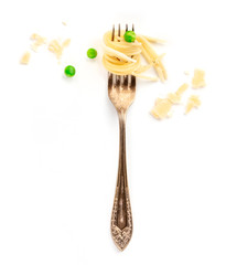 Italian pasta design element. A fork with spaghetti, green peas, and parmesan cheese, shot from above on a white background with copy space
