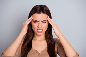 Close up photo beautiful furious she her lady eyes closed hands arms touch temples can't remind song name suffer terrible head ache hurt wear casual pastel pullover sweater isolated grey background