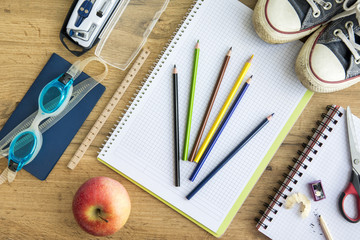 Colorful school accessories on table