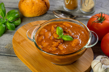 Stewed beans in tomato sauce.