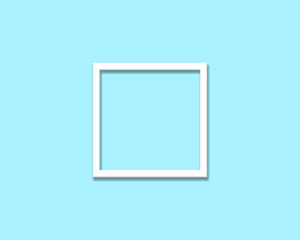blank white picture frame isolated on cyan background