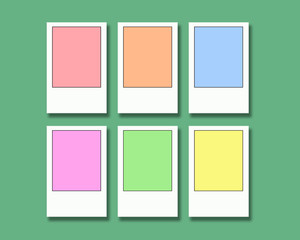 Pastel colored instant film frames on a light green background 