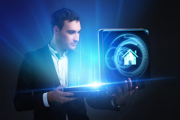 The concept of business, technology, the Internet and the network. A young entrepreneur working on a virtual screen of the future and sees the inscription: