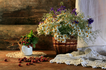 Meadow strawberry with meadow flowers