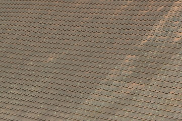 Dirty red tile on the roof