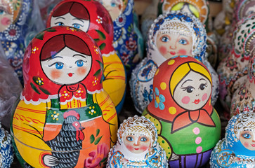 Fototapeta na wymiar Matryoshka is a national Russian souvenir. Russian wooden doll matryoshka on the counter of the gift shop. Nested doll.