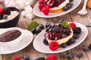 Cheesecakes with mixed berries. 