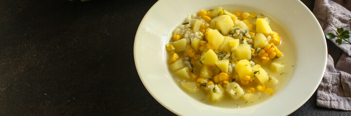 soup with corn and vegetables (cob, first course). top food background. copy space