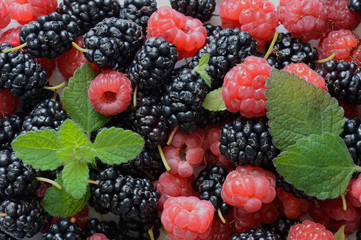 Texture of fresh berries of raspberry, cherry, mulberry