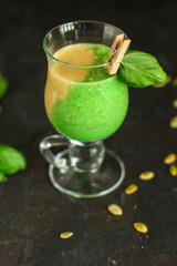 Smoothies, banana, avocado, chia seeds and more are healthy food concept. food background. top view