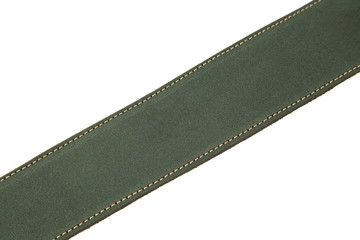 Green leather shoulder strap for a gun isolated on white background