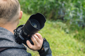 Fototapeta premium A photographer with the camera.