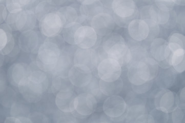 gray abstract bokeh background from nature environment. white blur abstract.  Christmas lights