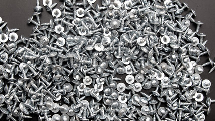 Sharp screws as abstract background
