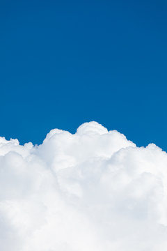 Rising Storm Cloud And Blue Sky In Sunshine