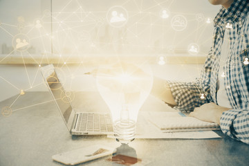 Social network theme hologram with businessman working on computer on background. Concept of world wide web. Double exposure.