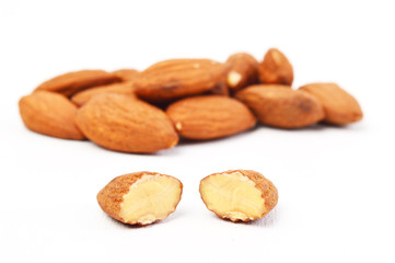 Group of almonds on white background