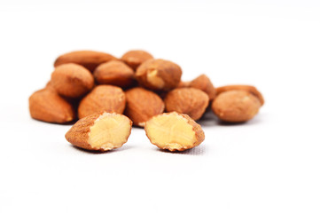 Group of almonds on white background