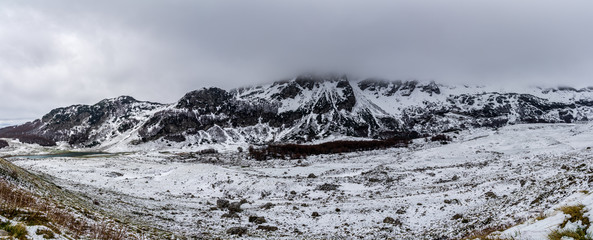 Montenegro, XXL panorama of snow covered nature landscape of spectacular durmitor mountains from sedlo pass route near zabljak