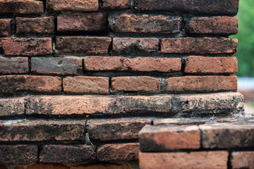 Details and closeup of red old and vintage style bricks from a historic architecture in Ayutthaya...
