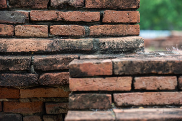 Details and closeup of red old and vintage style bricks from a historic architecture in Ayutthaya...